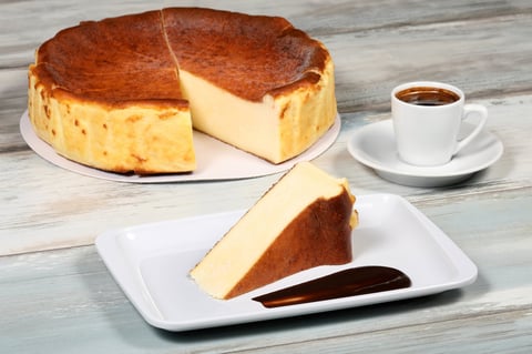 Sliced cheesecake with chocolate sauce