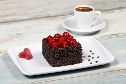 Chocolate cake with red currants